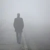 depositphotos_100316952-stock-photo-man-with-his-back-walking